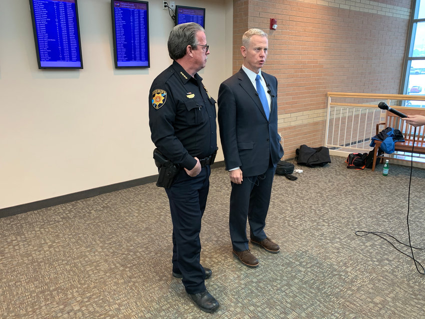 Eighteenth Judicial District Attorney George Brauchler and Sheriff Tony Spurlock speak to reporters following an arraignment for one STEM shooting suspect on Feb. 7.